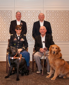 Mr. Stovroff & Cash (right) gather with Ret'd Lt. Col Kathy Champion (left) with her service dog, George.